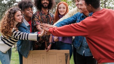 Young people with diverse origins fighting for peace and vindicating themselves Concept stop war