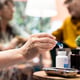 Professional nurse separating pills and medicine in two different bottles