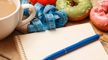 Colorful donuts and notepad