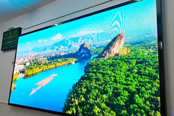 Home Jumbotron screen displaying vivid landscape visuals indoors
