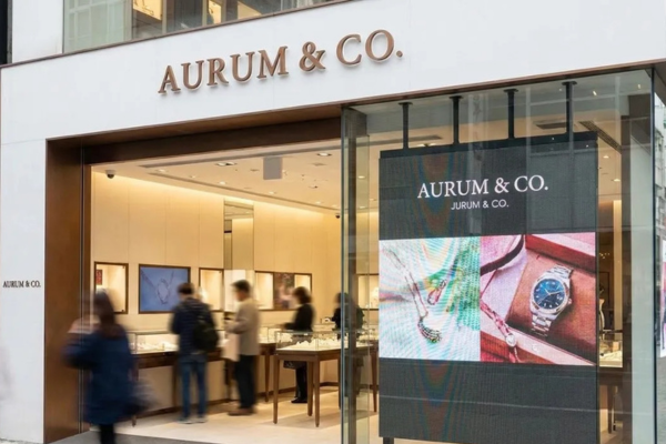 Transparent LED screen displayed in a retail storefront window
