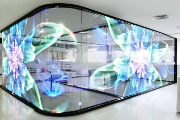 Transparent LED screen displaying floral visuals in a glass enclosure