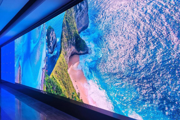 Jumbotron screen for home displaying vivid aerial beach visuals