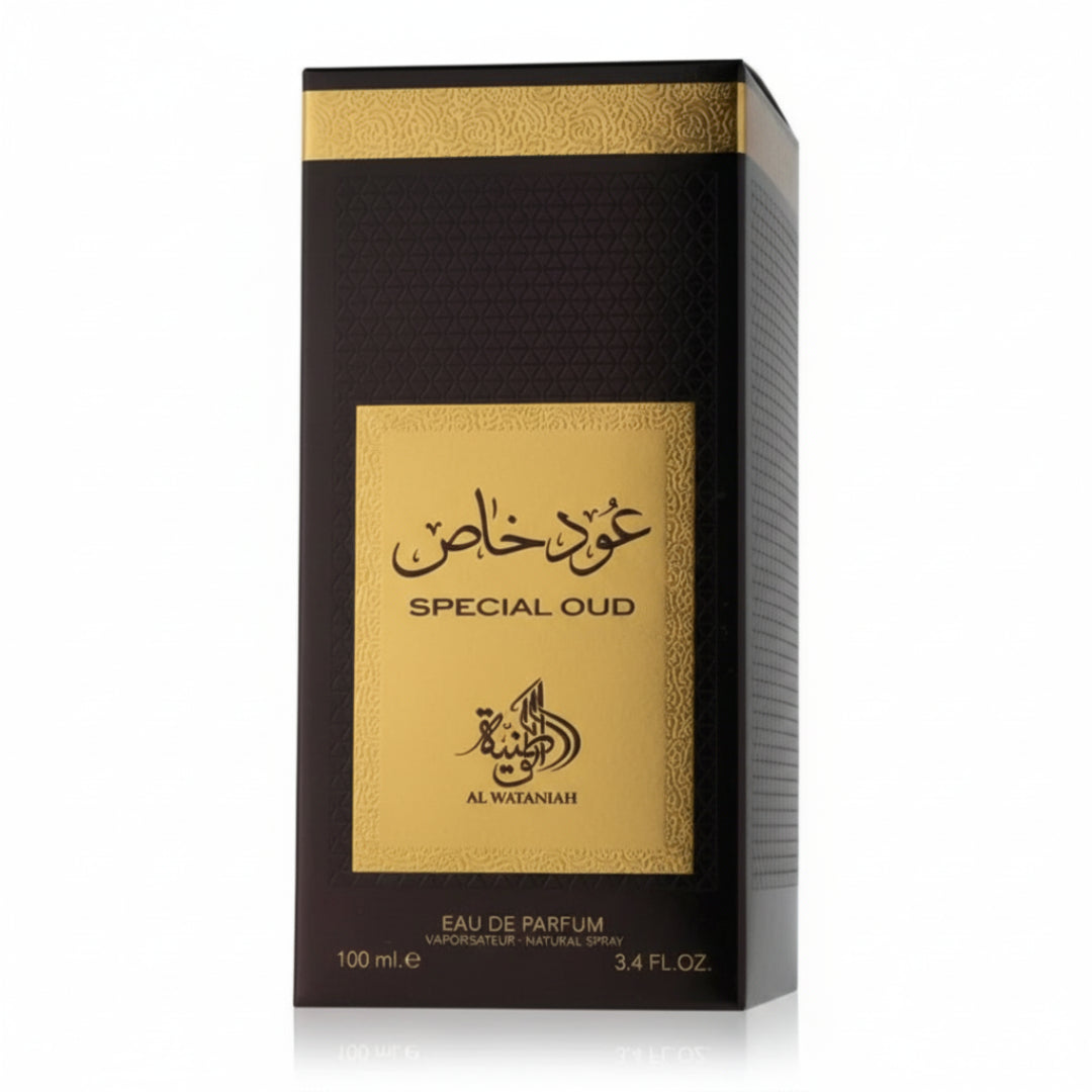Perfume box with gold and black design on a white background