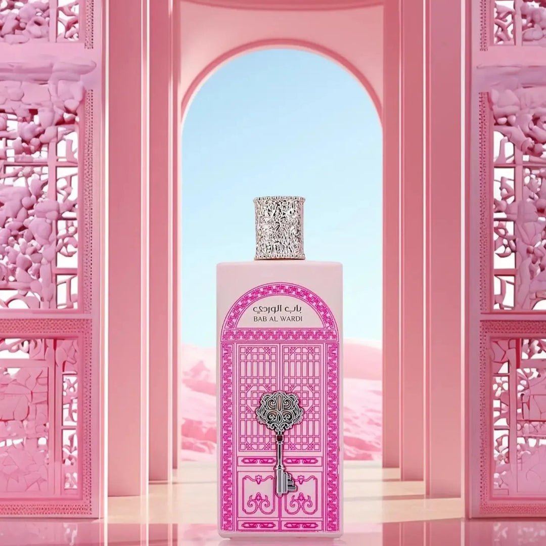 Pink perfume bottle with decorative cap in front of a pink archway