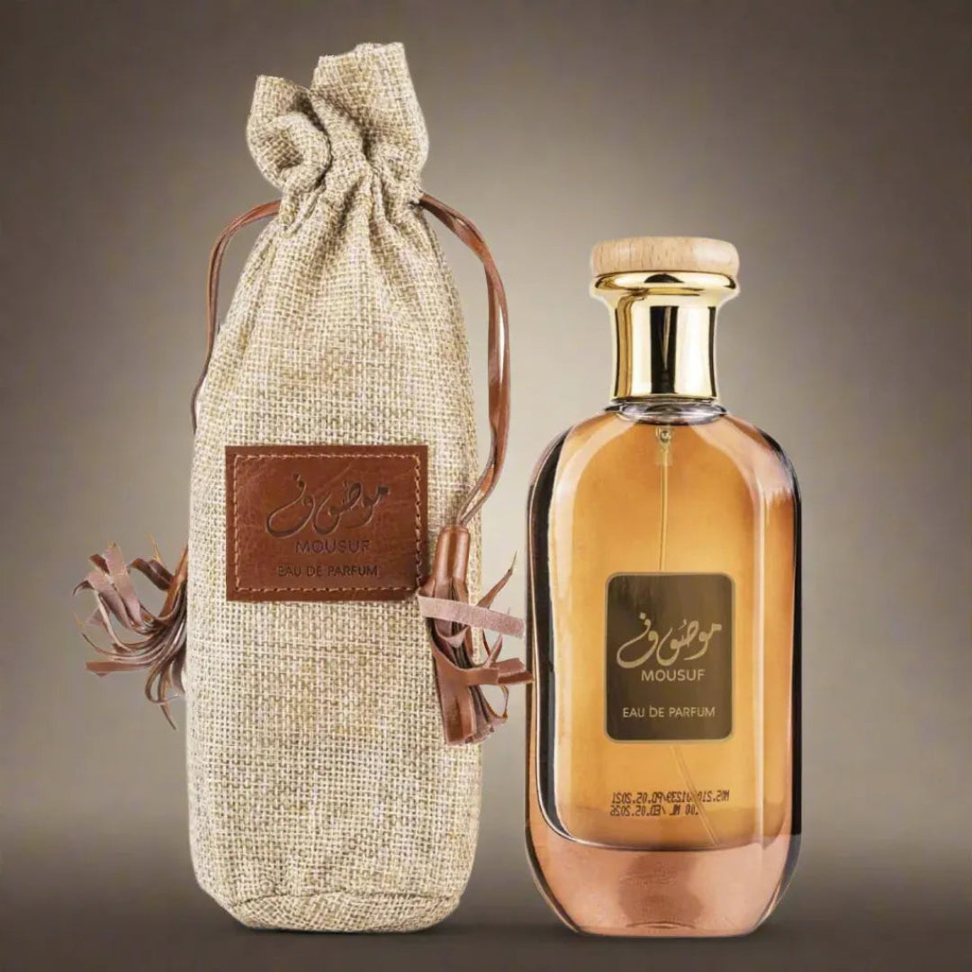 Perfume bottle with a textured bag on a gradient background