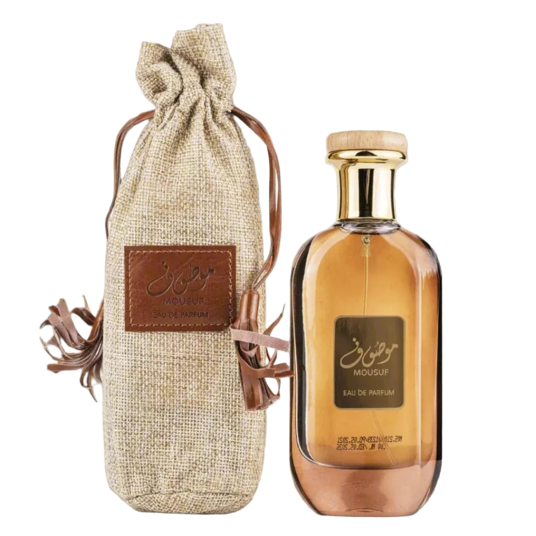 Perfume bottle with a textured bag on a gradient background