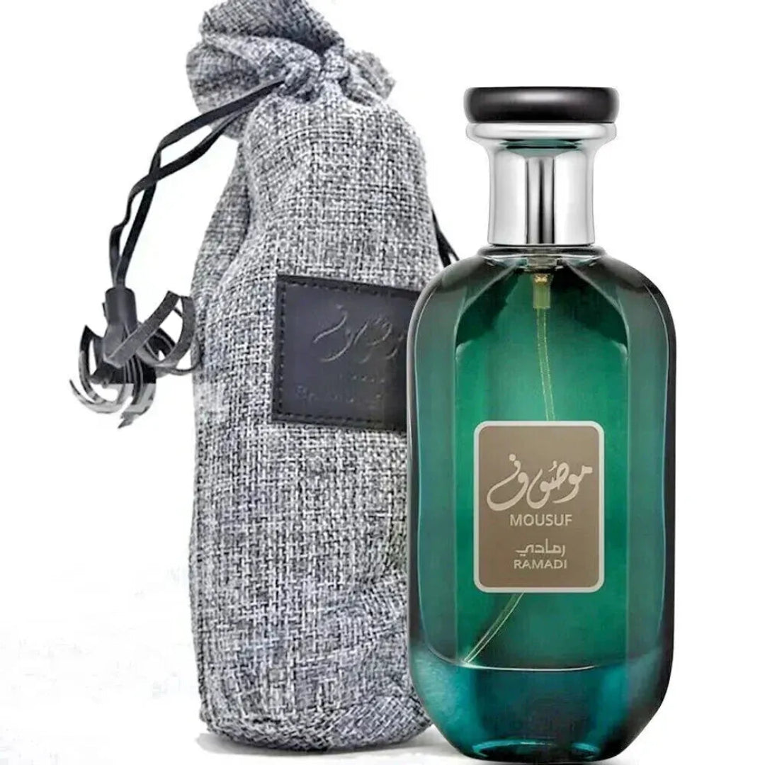Green perfume bottle with silver cap and gray textured pouch on a white background