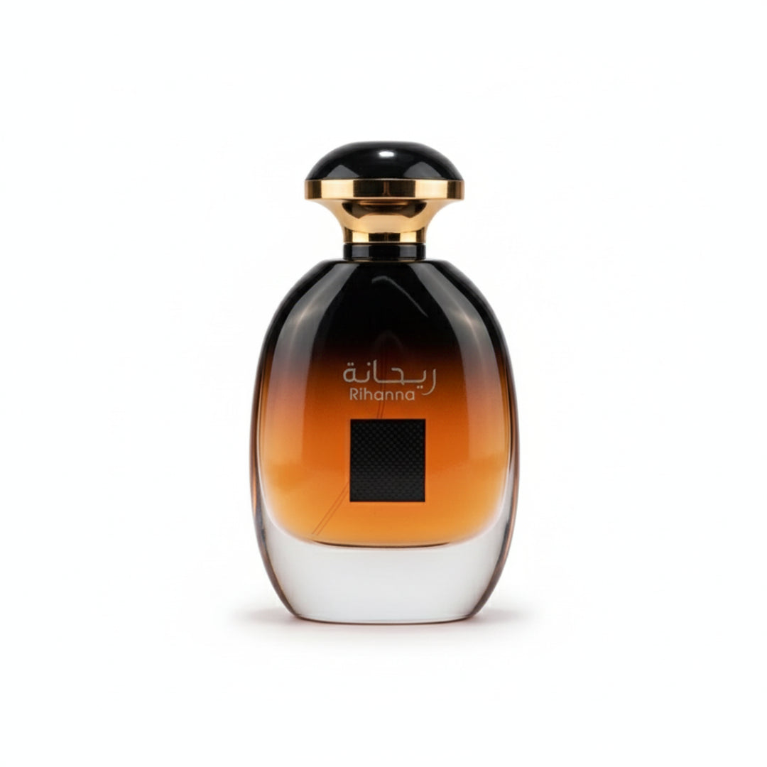 Perfume bottle with 'Rihanna' branding on a pink background