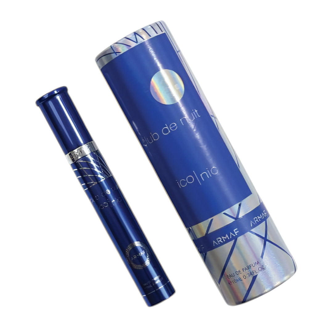 Blue perfume bottle and its packaging on a white background