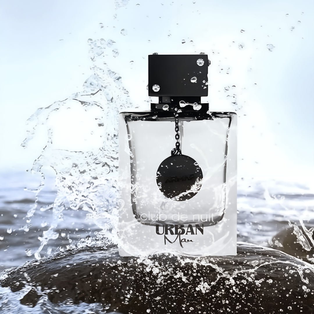 Perfume bottle labeled 'Urban Man' with water splashing around it Club de Nuit Urban Man Armaf for men