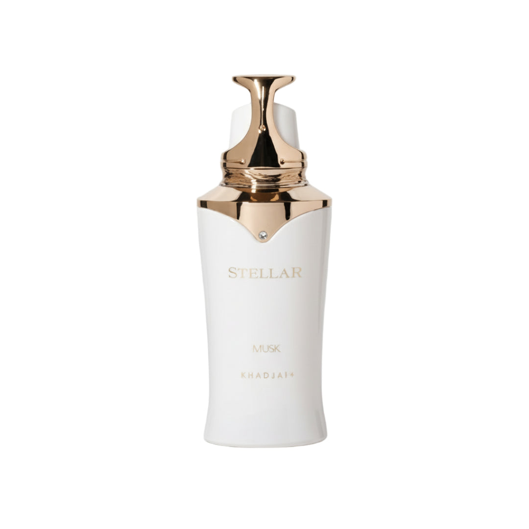 White skincare bottle with gold cap on a white background
