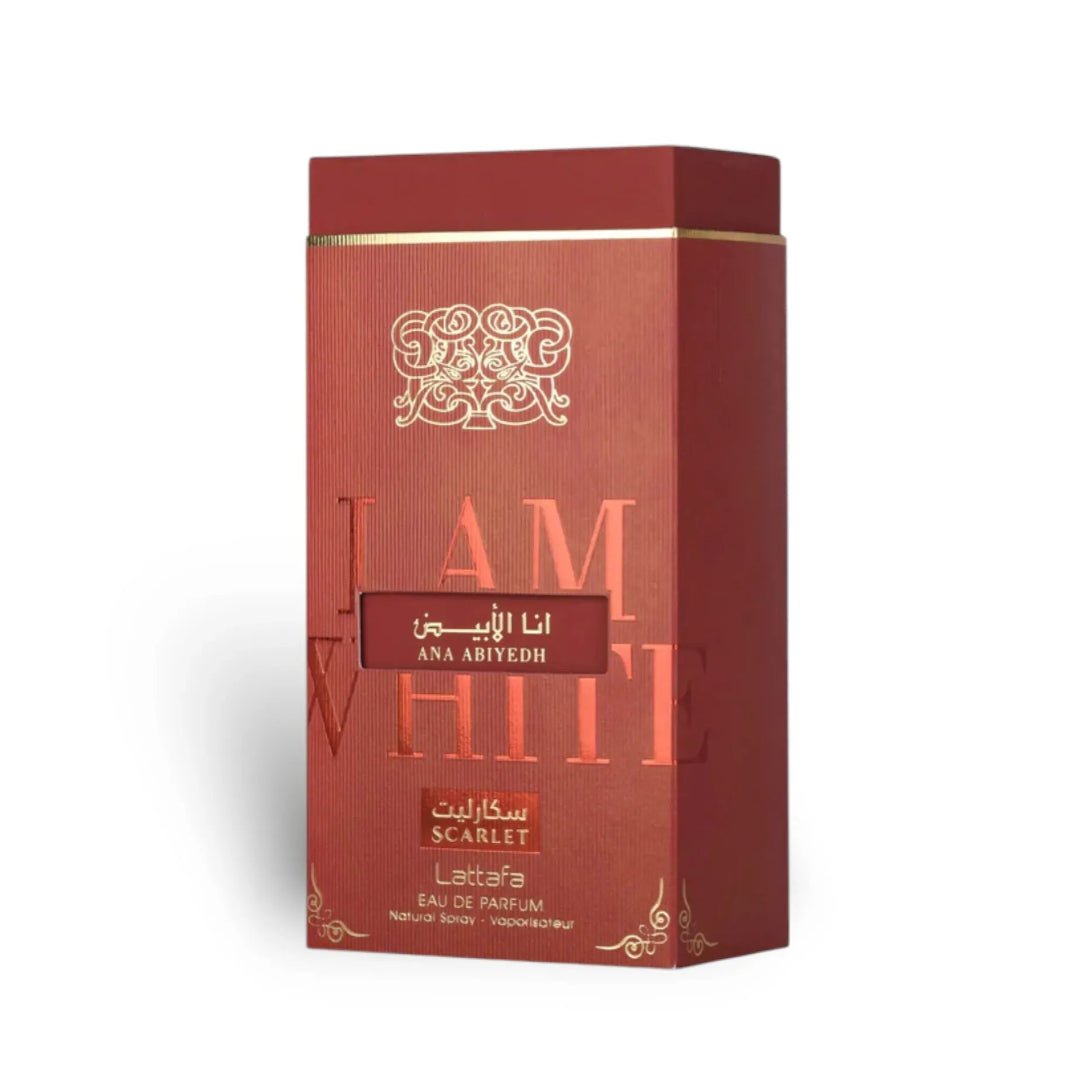 Red perfume box with gold accents and text on a white background