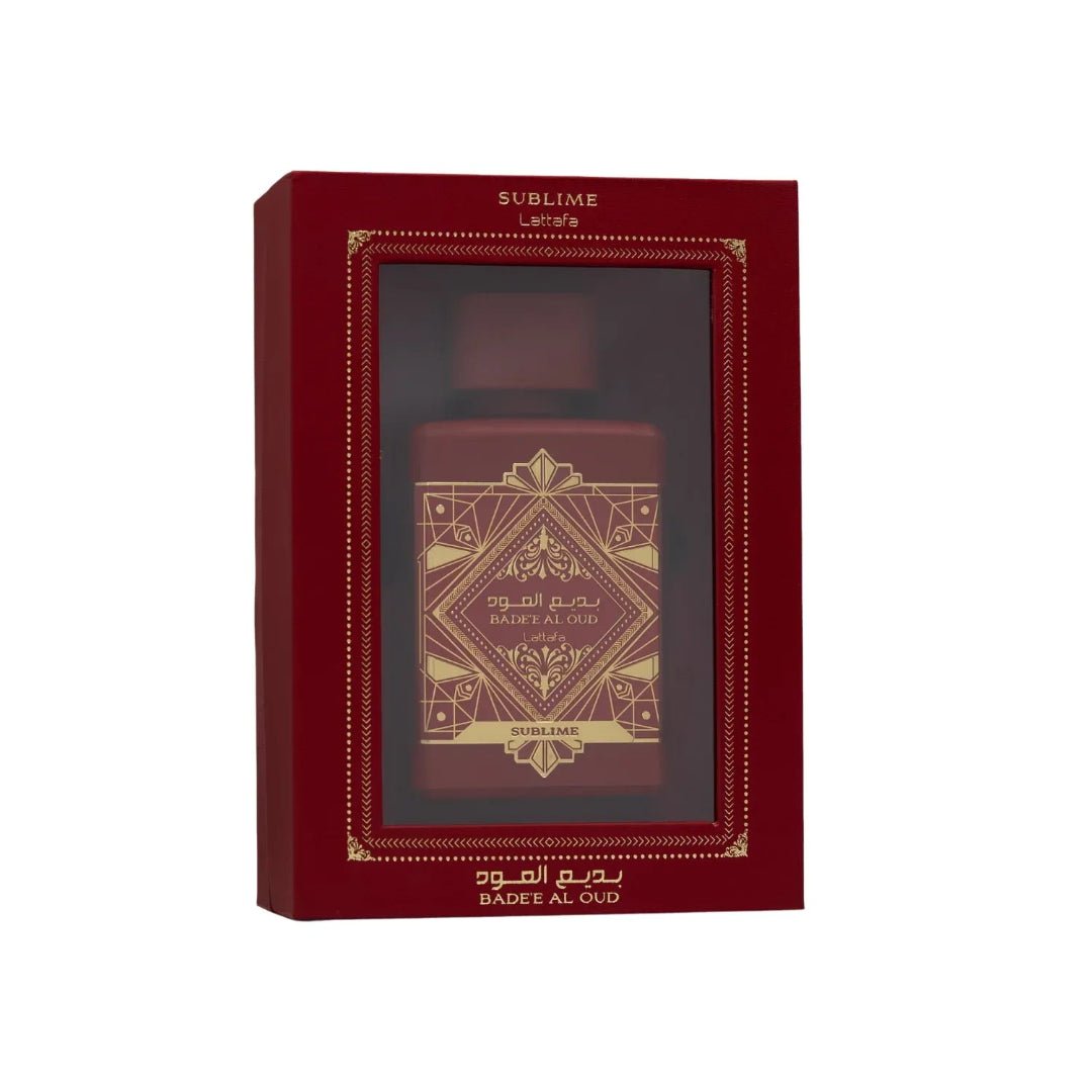 Red and gold perfume bottle packaging with intricate design on a white background