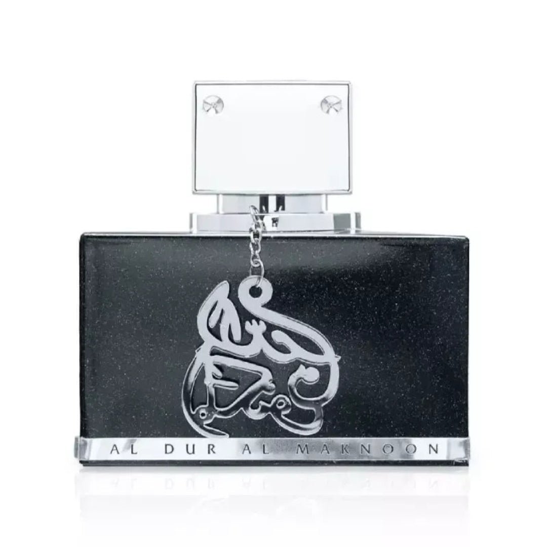 Black perfume bottle with Arabic text on a white background