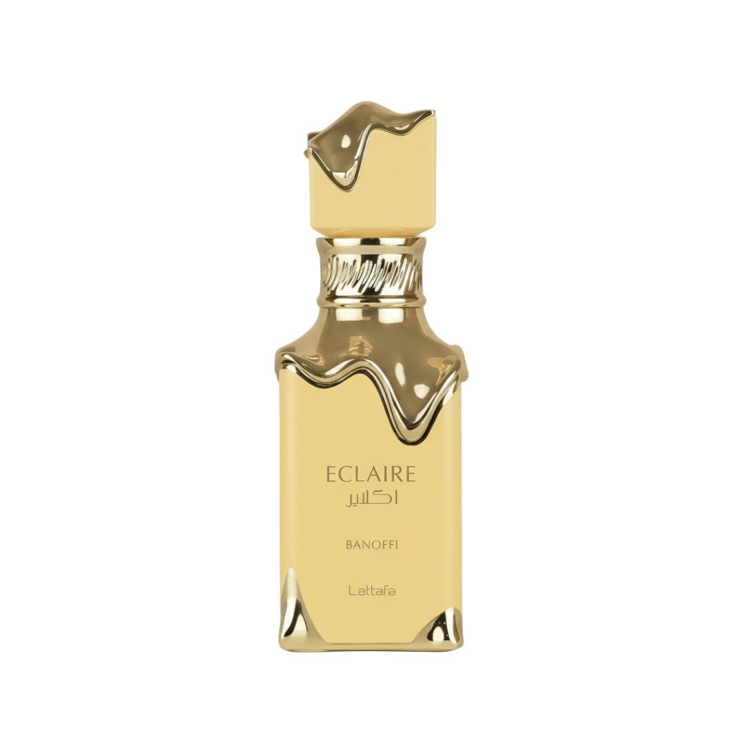 Gold perfume bottle with 'Eclaire' branding on a white background
