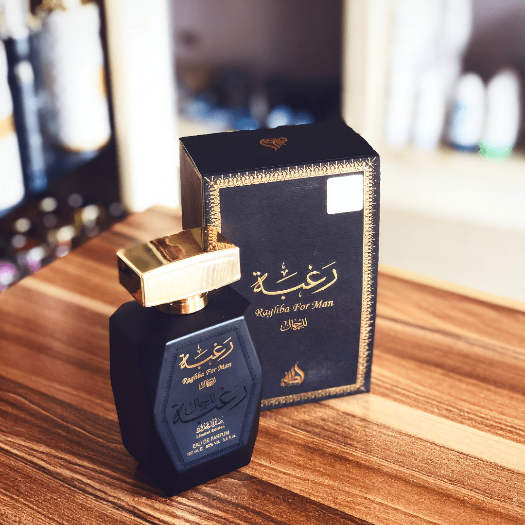 Perfume bottle and packaging on a wooden surface lattafa perfumes malaysia