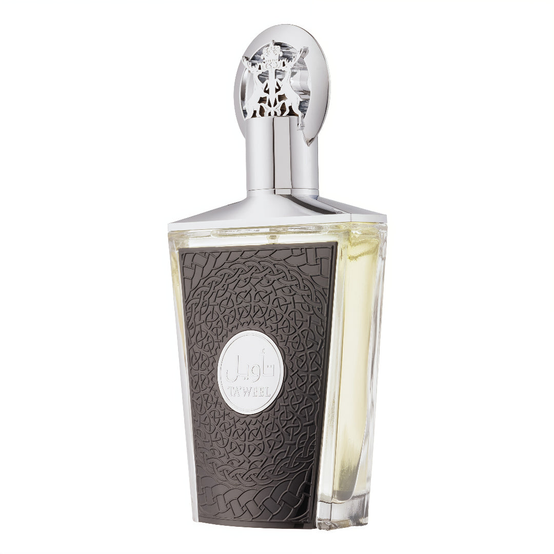 Perfume bottle with intricate design on a white background Taweel Lattafa