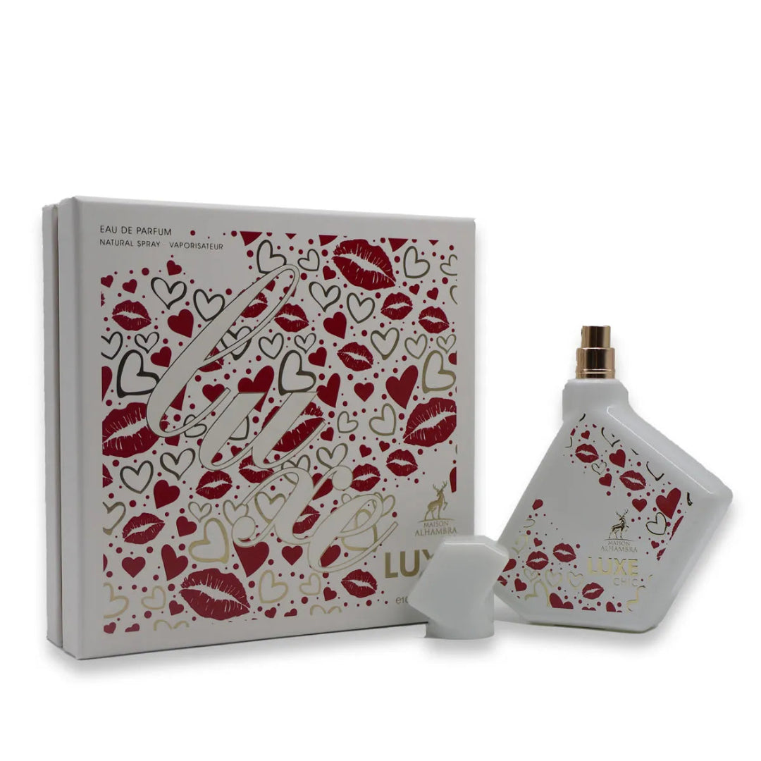 Perfume set with a decorative box featuring red lips and hearts on a white background