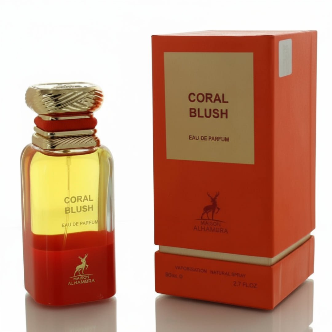 Coral Blush perfume bottle and packaging on a reflective surface