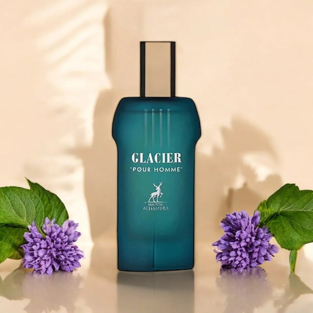 Blue Glacier Pour Homme perfume bottle with purple flowers and green leaves on a beige background