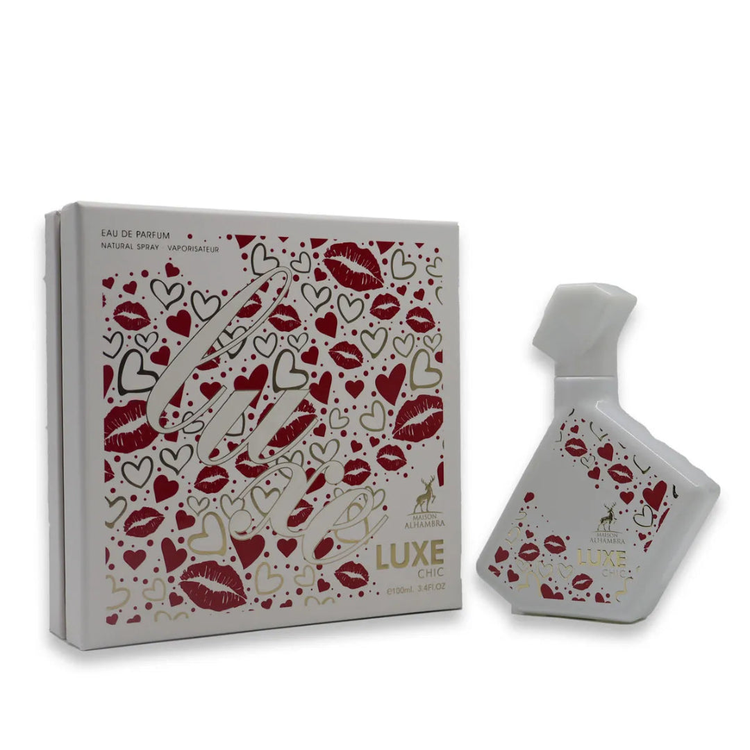 Luxe Chic perfume bottle and packaging with heart and lip designs on a white background