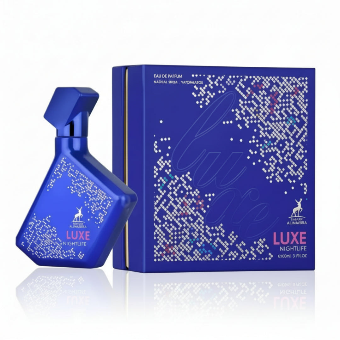 Blue perfume bottle and packaging with 'LUXE NIGHTLIFE' text on a white background