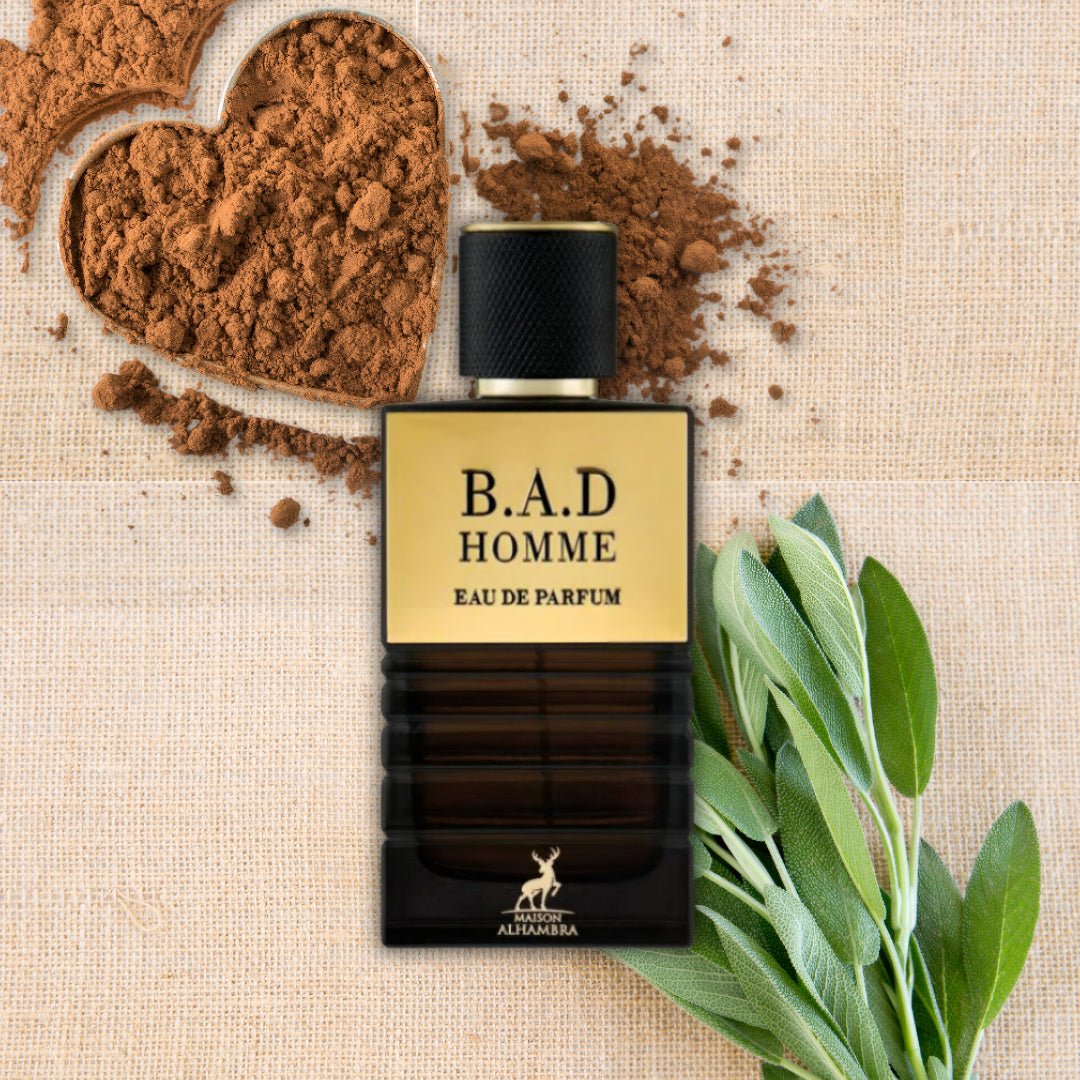 B.A.D Homme eau de parfum bottle with cocoa powder and leaves on a textured background