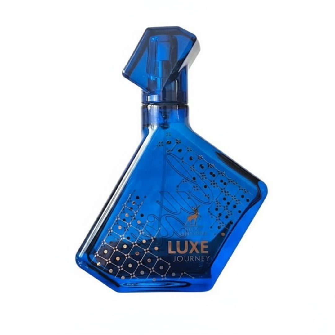 Blue perfume bottle with 'Luxe Journey' text on a white background