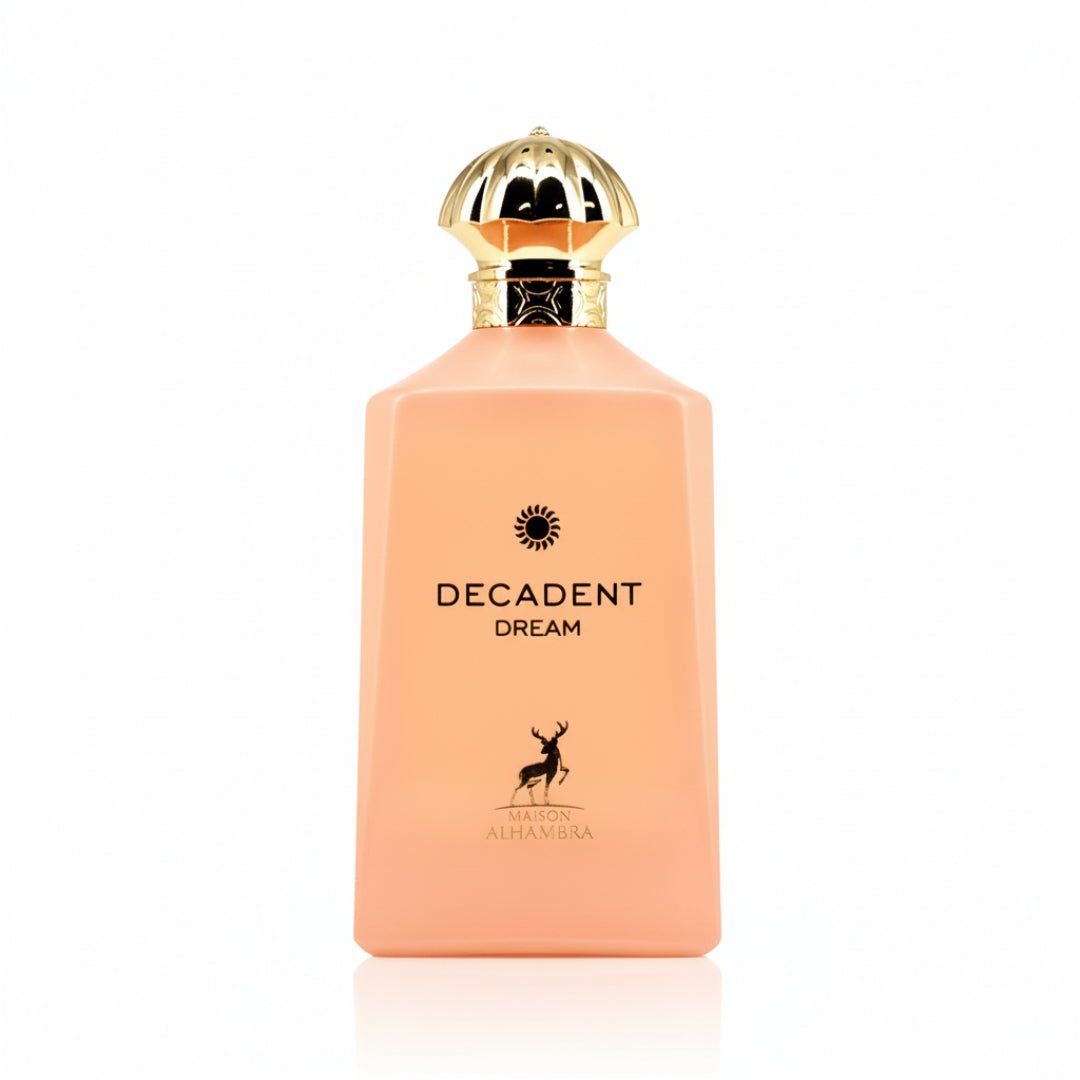 Perfume bottle labeled 'Decadent Dream' with a gold cap on a white background