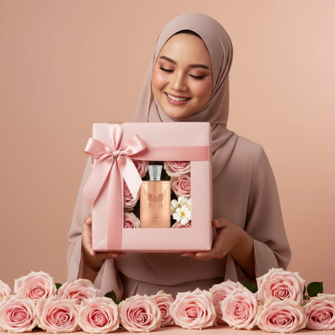 Malay woman unboxing Olivia by Maison Alhambra perfume gift pink roses women scent Malaysia