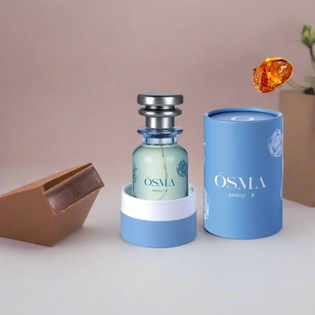 OSMA perfume bottle and packaging on a light blue background with ingredients displayed.