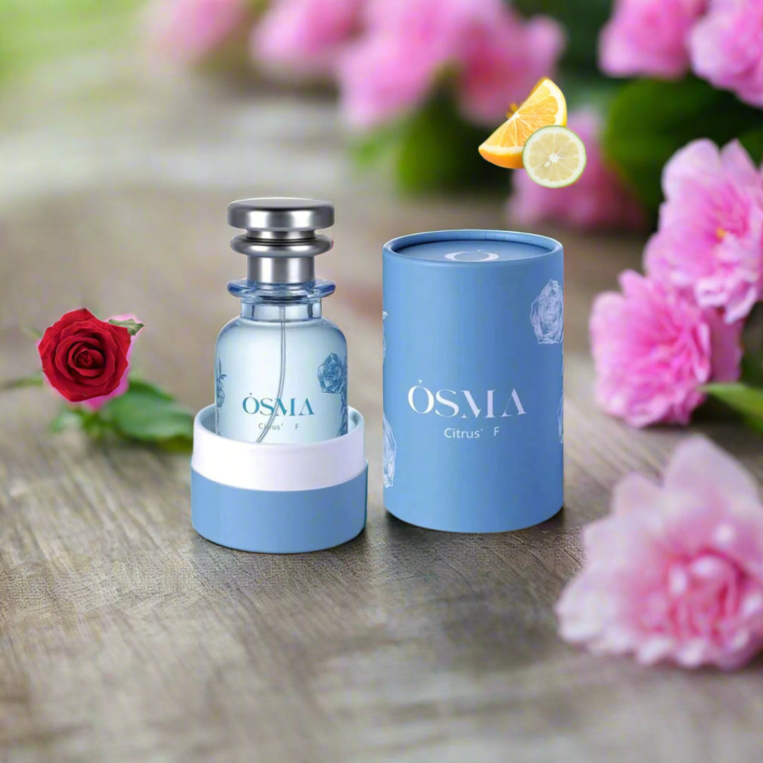 OSMA perfume bottle and packaging on a light blue background with ingredients displayed.