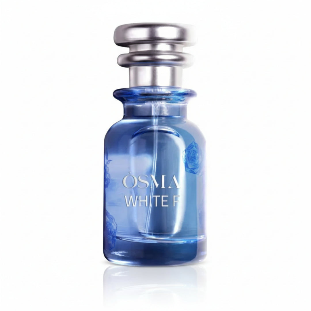 Blue perfume bottle with silver cap on a white background