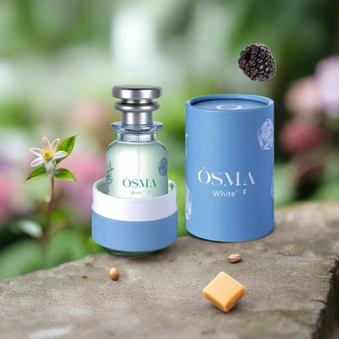 OSMA perfume bottle and packaging on a light blue background with ingredient labels.