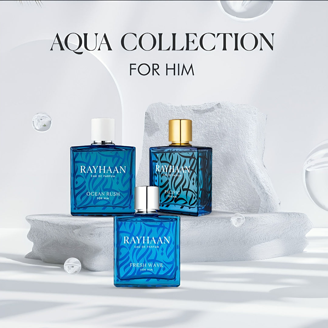 Three blue perfume bottles with gold caps on a white background, labeled 'Rayhaan Aqua Collection for Him'.