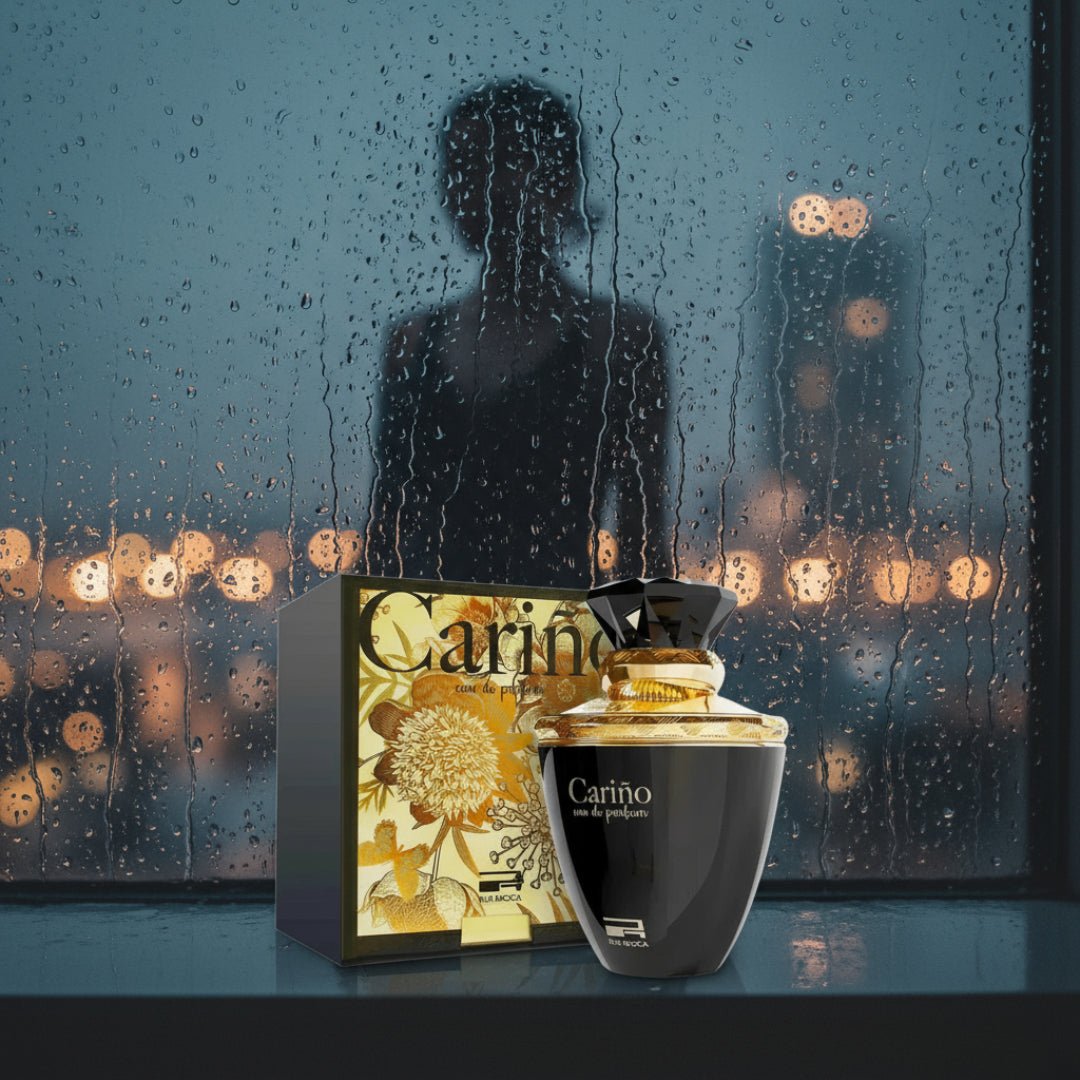 Carino Black by Rue Broca perfume bottle on rainy window Malaysian city lights women fragrance Malaysia