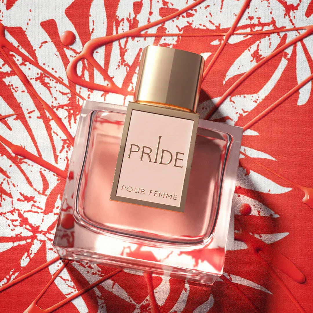 Perfume bottle labeled 'Pride Pour Femme' on a red and white abstract background