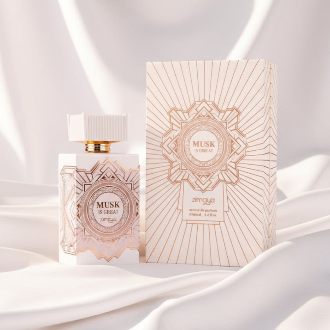 Musk Is Great by Zimaya perfume bottle on white silk cloth with soft daylight minimal unisex fragrance Malaysia”