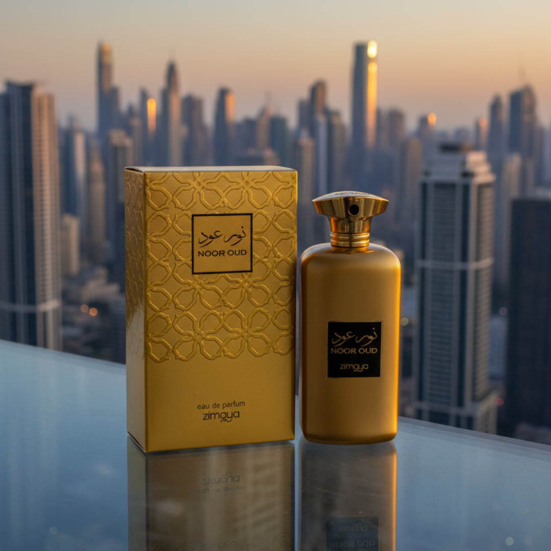 Noor Oud Dubai by Zimaya perfume bottle on glass balcony overlooking Dubai skyline luxury unisex perfume Malaysia