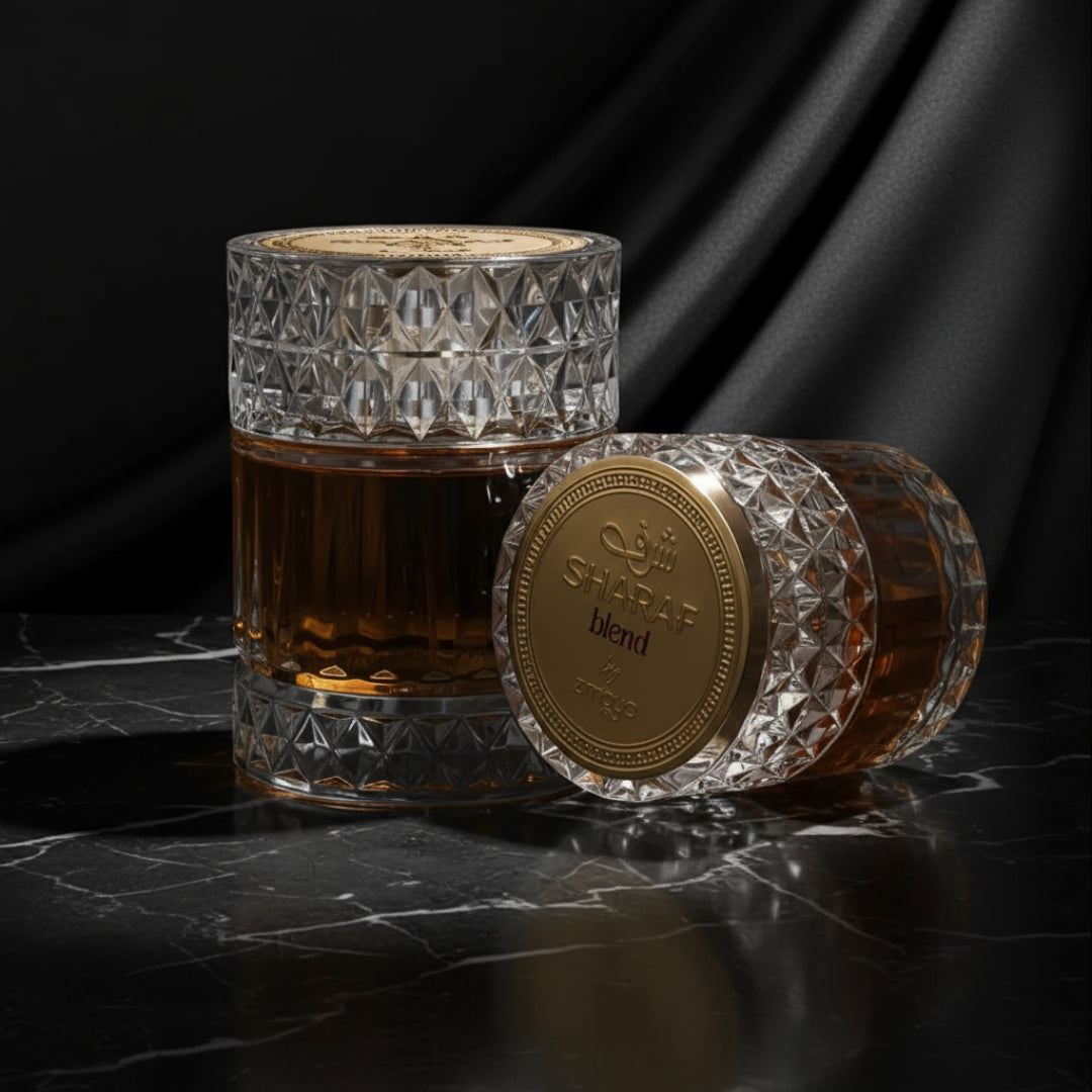 Sharaf Blend by Zimaya perfume bottle on black marble with spotlight modern luxury unisex scent Malaysia