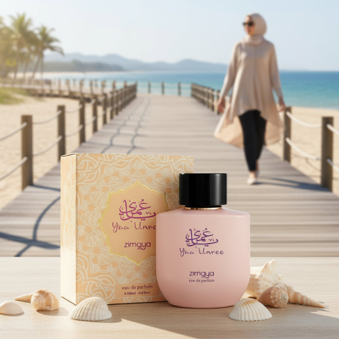 Malay woman by beach with Zimaya Yaa Umree perfume bottle and box seaside fresh floral scent Malaysia”