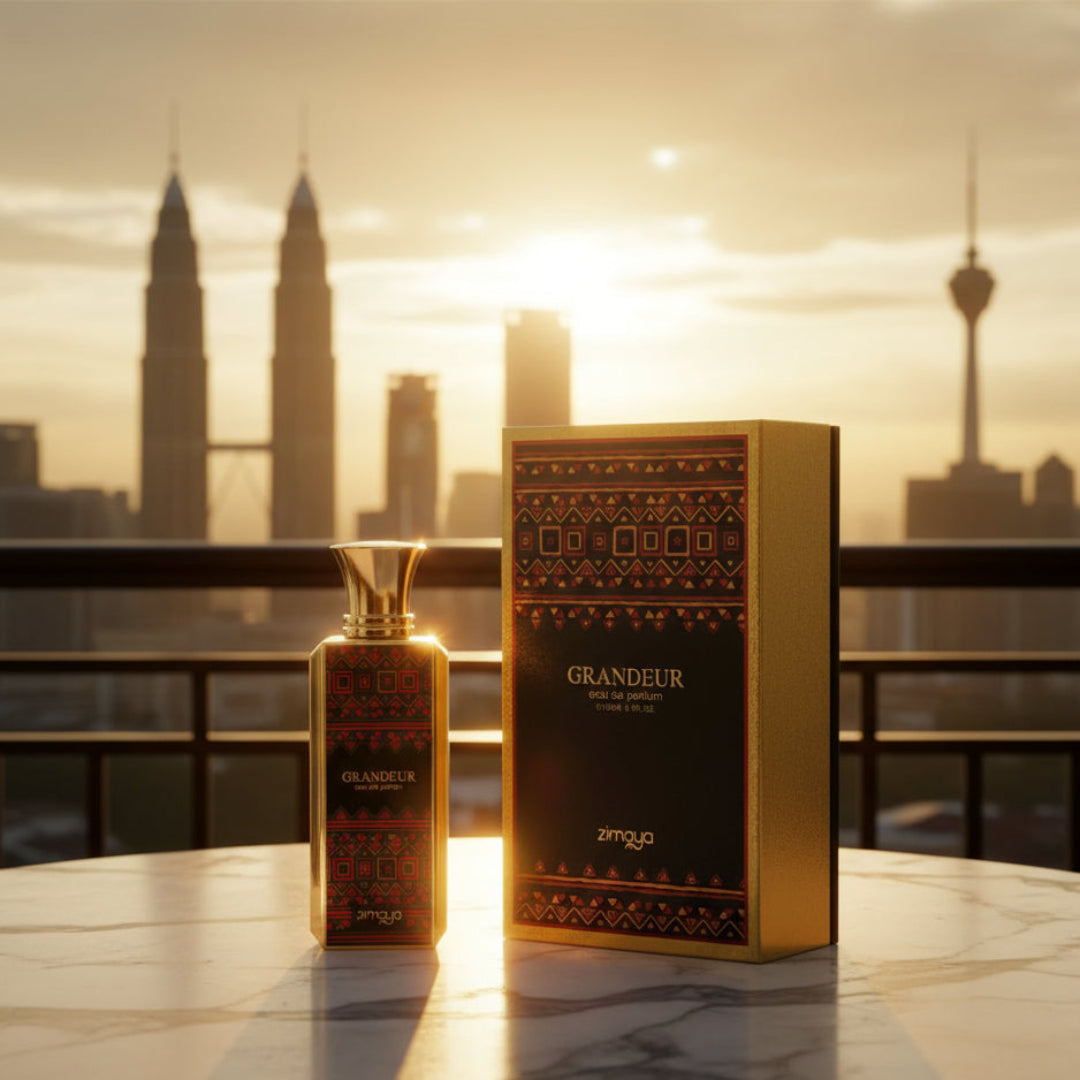 Zimaya Grandeur perfume bottle on marble balcony table golden sunset light Kuala Lumpur skyline unisex fragrance Malaysia”