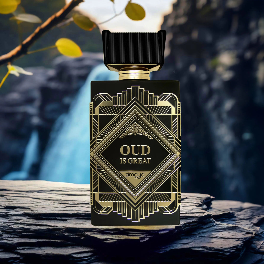 Perfume bottle labeled 'Oud is Great' by Zinqua on a stone surface with a natural background.