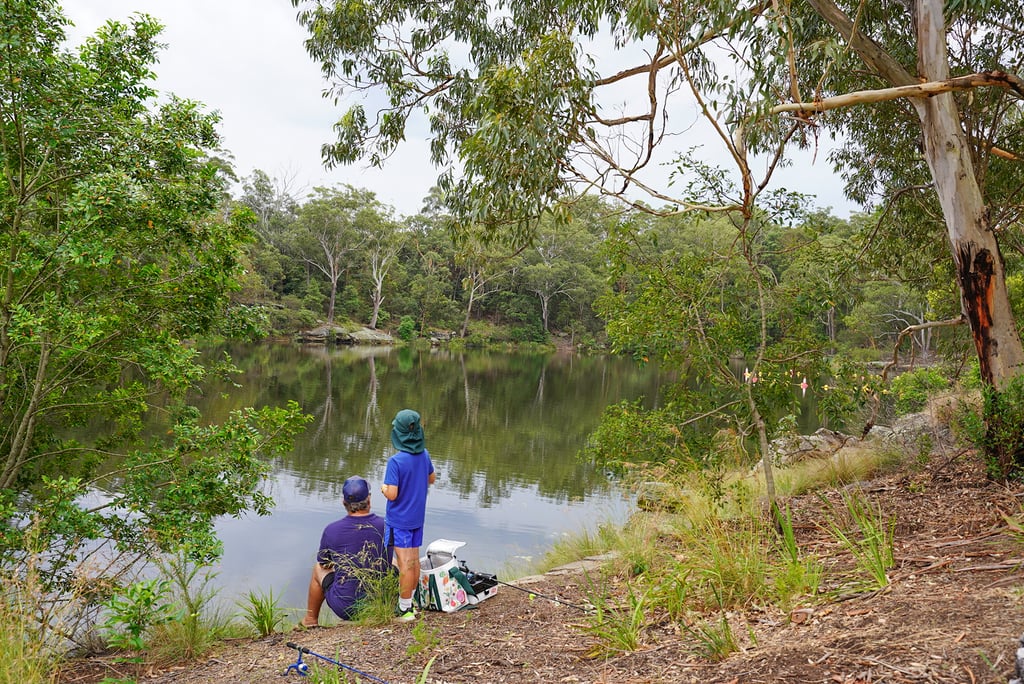 Dad and son fishing at Lake Parramatta, Sydney