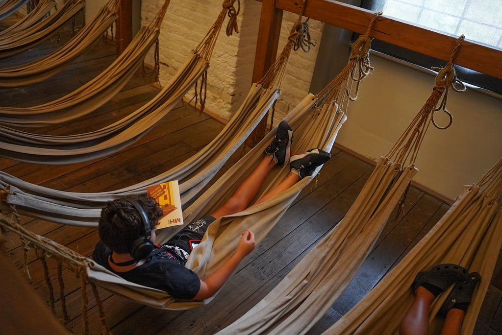 Kids enjoying the re-created convict hammocks at Hyde Park Barracks.