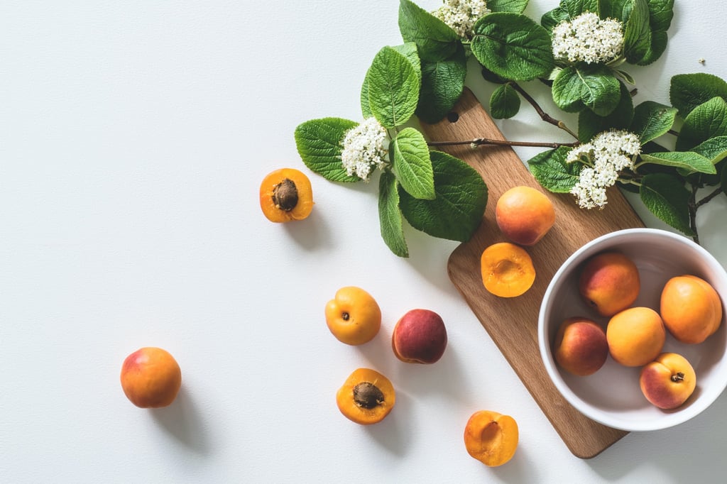 stone fruit on table and cutting board