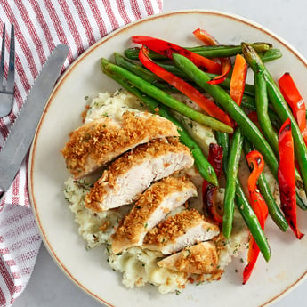 Roasted Garlic Pesto-Crusted Chicken with Rosemary Mashed Potatoes with Vegetables