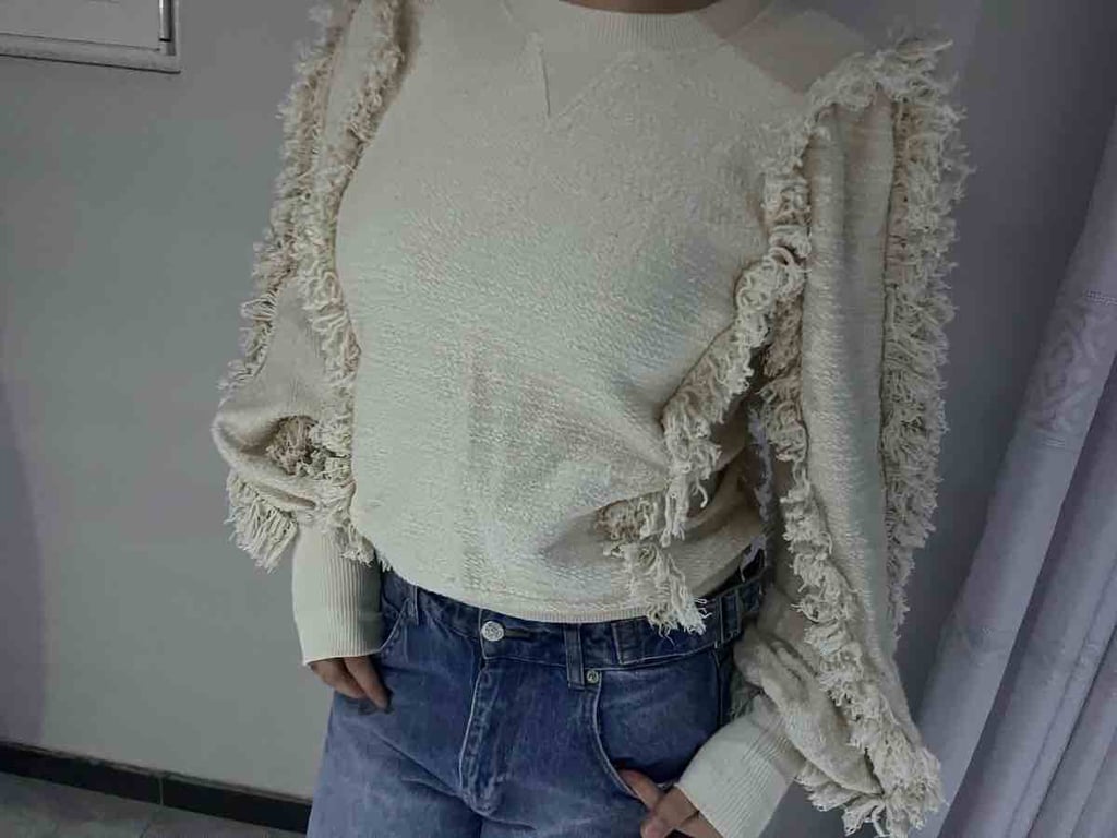 Fotografi e Triko  në LIST.AL