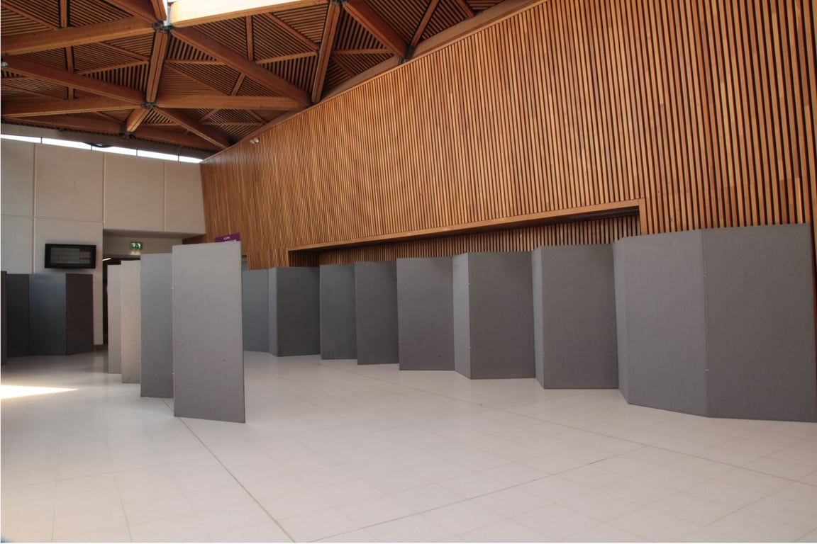 Poster display boards set up in a bright exhibition space